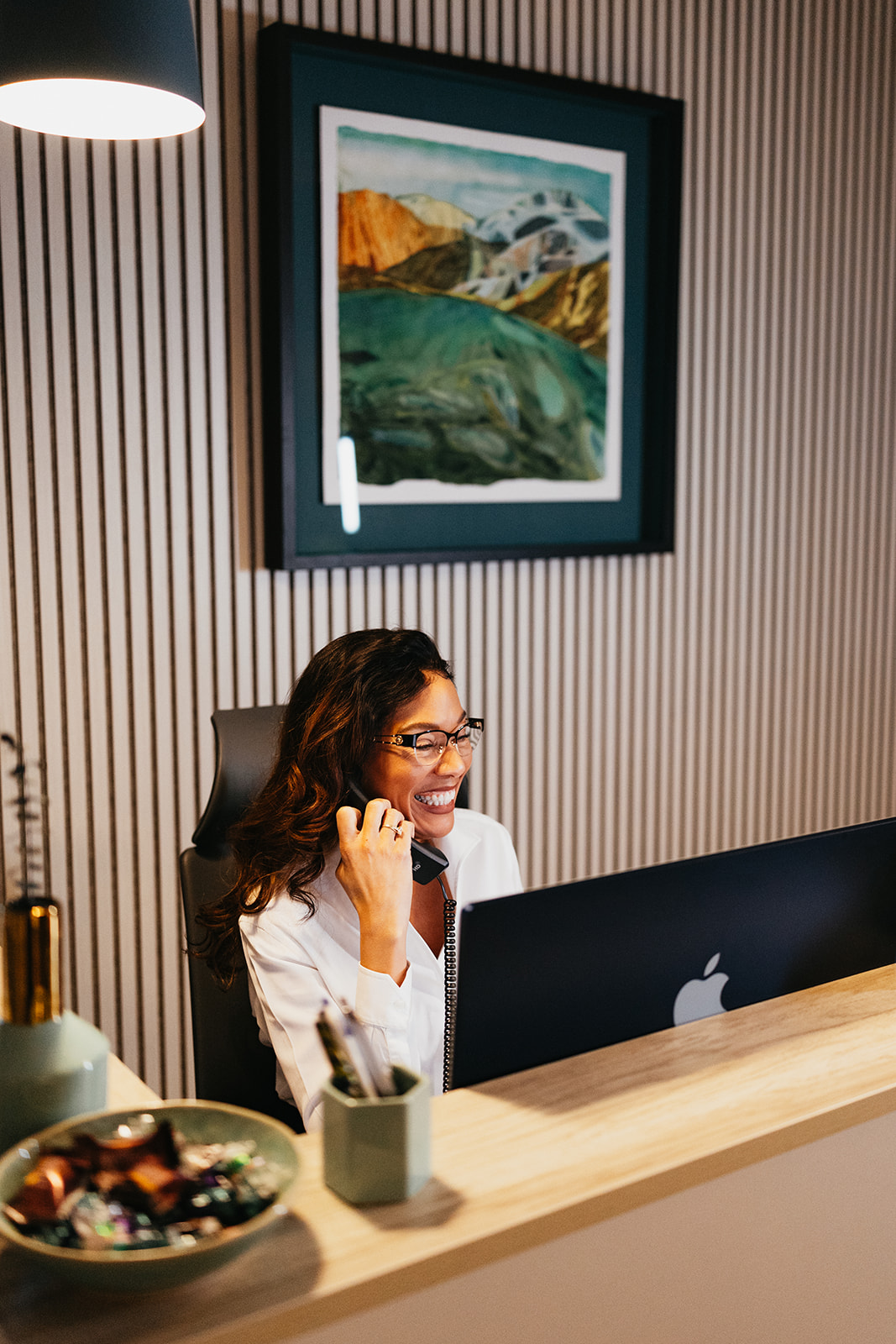 Woman on phone in office