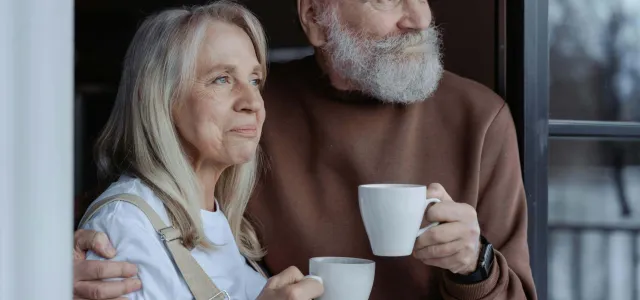 Retired couple having coffee